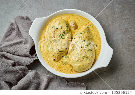 delicious chicken breast meat with creamy sauce in white bowl delicious chicken breast meat with creamy sauce in white bowl 135296134