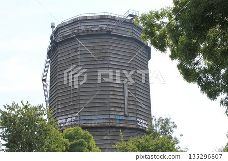 Old industrial gasometer in Brescia, Italy 135296807