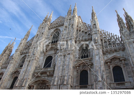 Milan Cathedral or Duomo di Milano is the cathedral church. famous landmark of Milan, Italy Milan Cathedral or Duomo di Milano is the cathedral church. famous landmark of Milan, Italy 135297086