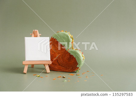 Delightful and vibrant heartshaped pastry croissant treat, beautifully topped with colorful frosting nut galore. Mock up template copy space. Food experimentation viral dessert creative 135297583