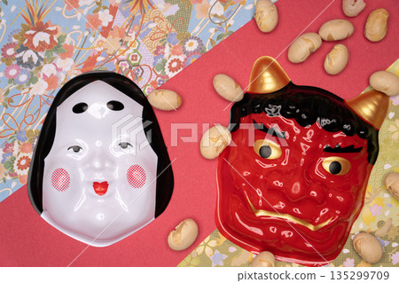 Setsubun photo of demons and Otafuku masks scattering beans 135299709