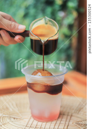 coffee pouring down for making American Peach for fresh drinking of mixed coffee ideas 135300524