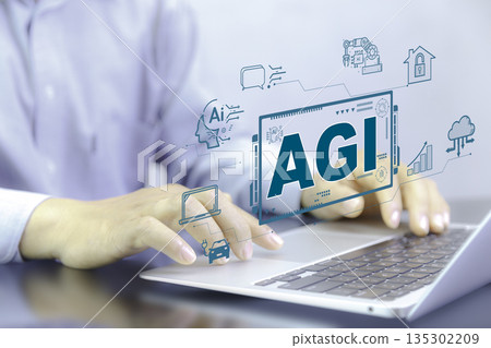 person working on laptop with a digital interface showing "AGI" and related icons like smart home, robotics, and autonomous car, symbolizing AI's future. person working on laptop with a digital interface showing "AGI" and related icons like smart home, robotics, and autonomous car, symbolizing AI's future. 135302209