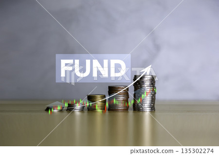 Fund, Save money, dividend and Interest rate concept. symbol and arrow pointing up on gold coins instead Return on Stocks, Funds long-term investment. income return retirement fund at stock market. Fund, Save money, dividend and Interest rate concept. symbol and arrow pointing up on gold coins instead Return on Stocks, Funds long-term investment. income return retirement fund at stock market. 135302274