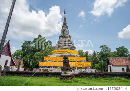 The sacred pagoda enshrined the Buddha's relics in Wat Phra Fang temple in Uttaradit province of Thailand. Built since 1700 B.E. during Sukhothai period. The sacred pagoda enshrined the Buddha's relics in Wat Phra Fang temple in Uttaradit province of Thailand. Built since 1700 B.E. during Sukhothai period. 135302444