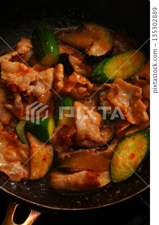 Cooking scene of stir-fried eggplant, cucumber, and pork with spicy miso Cooking scene of stir-fried eggplant, cucumber, and pork with spicy miso 135302889