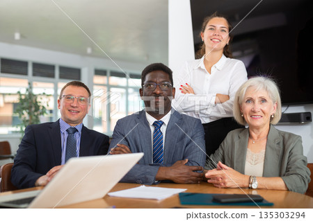 Snapshot of successful businessmen after making profitable deal Snapshot of successful businessmen after making profitable deal 135303294