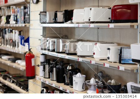 Shop window and shelves, small household appliances department. Shop window and shelves, small household appliances department. 135303414