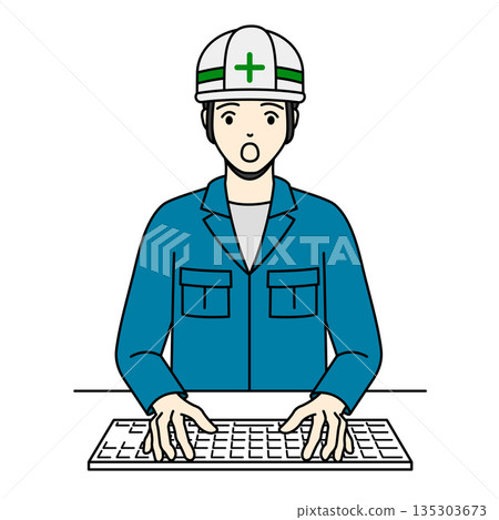 A field worker wearing a helmet and operating a computer in surprise 135303673