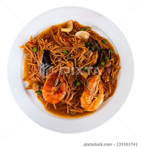 Pasta with seafood contains tiger prawns, shell mussels, spices and white sauce Pasta with seafood contains tiger prawns, shell mussels, spices and white sauce 135303741