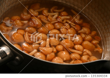 Nameko mushrooms in a pot 135304334