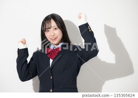 A high school girl's whole body, upper body, fist pump, looking at the camera, against a white background A high school girl's whole body, upper body, fist pump, looking at the camera, against a white background 135305624