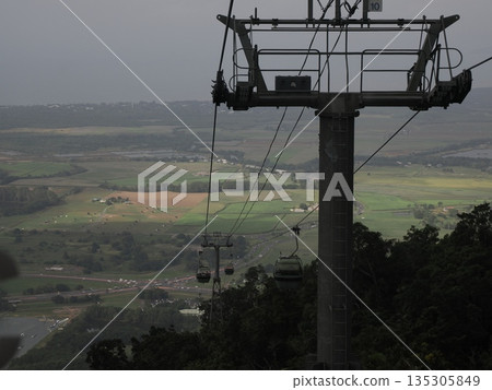 Gondola and forest view from high above - Kuranda Village Skyrail 135305849