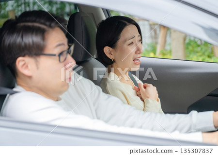 Driving men and women Driving men and women 135307837
