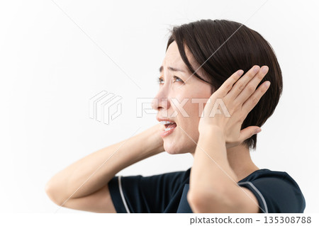 Young woman wearing beauty salon uniform Beauty image 135308788