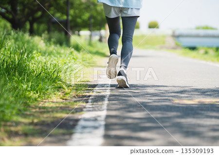 Young woman running sports image 135309193