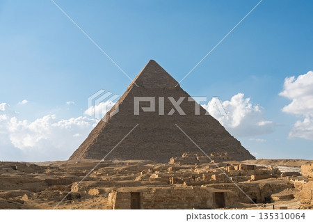 Majestic Great Pyramid of Giza Marvels Against a Stunning Blue Sky with Cloudscape Majestic Great Pyramid of Giza Marvels Against a Stunning Blue Sky with Cloudscape 135310064