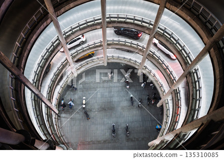 Aerial view of the city's multi-level spiral parking garage Aerial view of the city's multi-level spiral parking garage 135310085
