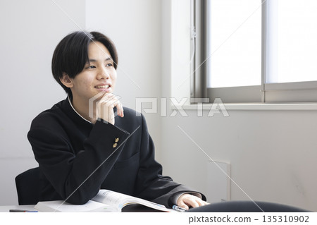 Male high school student studying Male high school student studying 135310902