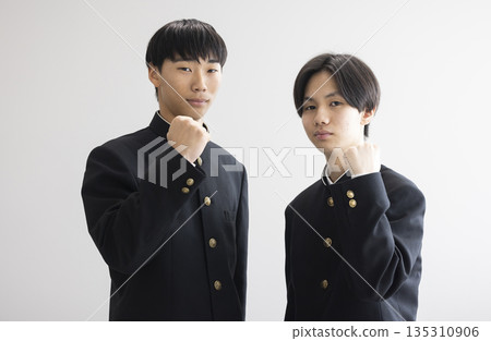 Male student in school uniform Male student in school uniform 135310906