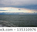 The Shiretoko Peninsula as seen from the coast of Shibetsu, Hokkaido 135310976
