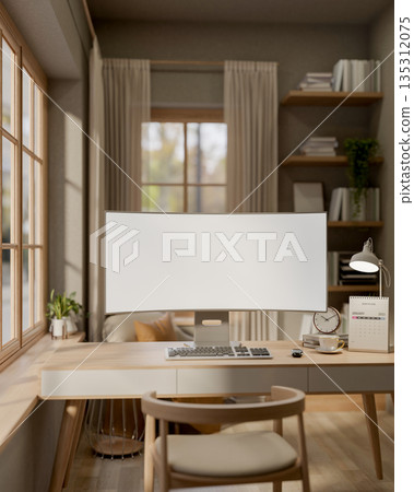White curved screen computer on wooden table in a room with bookshelf and sunlight through windows. White curved screen computer on wooden table in a room with bookshelf and sunlight through windows. 135312075
