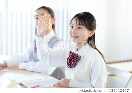 Junior high school girls studying at cram school 135312107