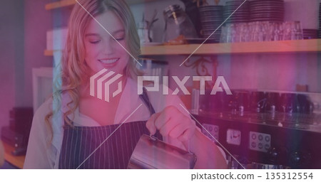 Steaming milk barista in white shirt and apron in cafe, with stainless pitcher, espresso machine Steaming milk barista in white shirt and apron in cafe, with stainless pitcher, espresso machine 135312554