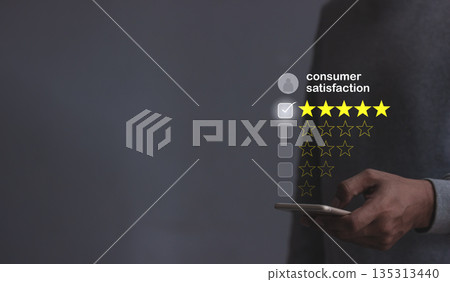 Consumer Satisfaction, Young Man hand holding Smart Phone with five star to review and give 5 stars with very good results in service, Good review 5 star rating choice feedback Consumer Satisfaction, Young Man hand holding Smart Phone with five star to review and give 5 stars with very good results in service, Good review 5 star rating choice feedback 135313440
