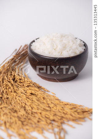 White rice in wooden bowl on white background, Rice from asia, Rice food of asian style White rice in wooden bowl on white background, Rice from asia, Rice food of asian style 135313445