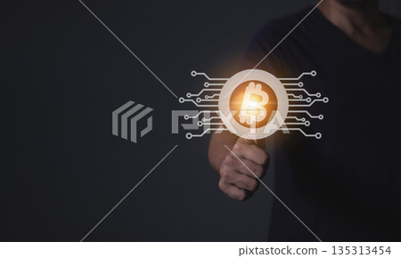 Young man using smartphone hand touching to trade cryptocurrencies online, Investors in cryptocurrencies and bitcoin coins online Young man using smartphone hand touching to trade cryptocurrencies online, Investors in cryptocurrencies and bitcoin coins online 135313454