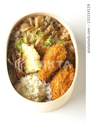 Mushroom rice and fried oyster bento photographed on a white background Mushroom rice and fried oyster bento photographed on a white background 135314119