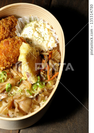Mushroom rice and fried oyster bento 135314780