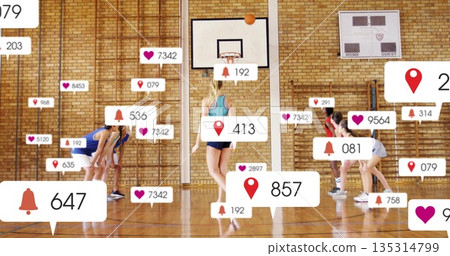 Dribbling white teenage girl maneuvering basketball on school gym court, with digital overlays Dribbling white teenage girl maneuvering basketball on school gym court, with digital overlays 135314799
