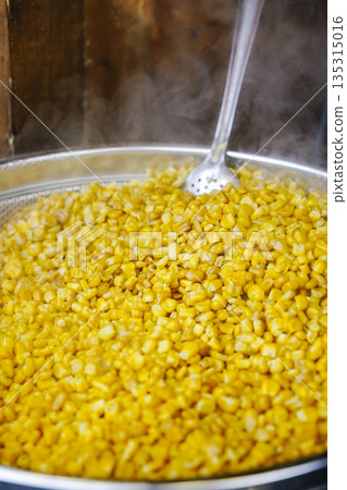 Hot Boiled Corn on the Cob in Large Pot at Street Food Market Hot Boiled Corn on the Cob in Large Pot at Street Food Market 135315016