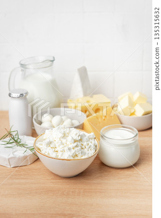 Assortment of fresh dairy products on wooden table Assortment of fresh dairy products on wooden table 135315632