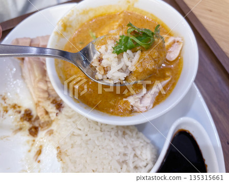 Singaporean chicken rice and Hainanese chicken rice are classic Asian dishes. 135315661