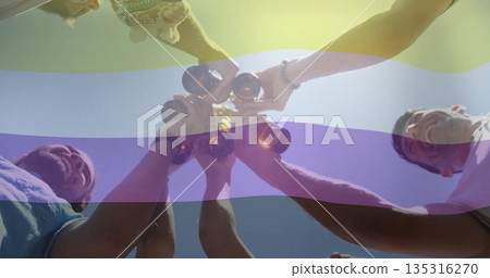 Five friends clinking brown beer bottles outdoors under clear sky, wearing summer tops, bracelets Five friends clinking brown beer bottles outdoors under clear sky, wearing summer tops, bracelets 135316270