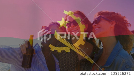 Smiling friends taking selfie at sandy beach wearing sunglasses, with smartphone and beer bottle Smiling friends taking selfie at sandy beach wearing sunglasses, with smartphone and beer bottle 135316271