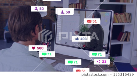 Watching man wearing glasses viewing flip chart presentation at office, with keyboard, copy space Watching man wearing glasses viewing flip chart presentation at office, with keyboard, copy space 135316459