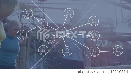 Gripping wooden bar, five women exercising at outdoor fitness park, displaying network overlay 135316564