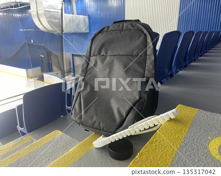 skate guard and backpack in stadium 135317042