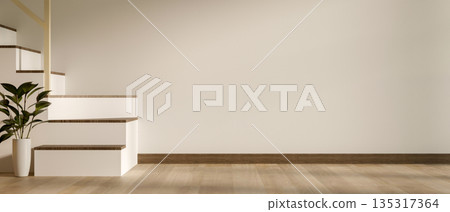 A wooden armchair with pillow and blanket with side table at room corner near loft wall and window 135317364