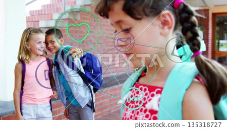 Standing three schoolchildren interacting at brick corridor, with backpacks and social media icons Standing three schoolchildren interacting at brick corridor, with backpacks and social media icons 135318727