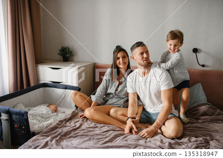 Joyful Family Moment With Two Kids At Home Joyful Family Moment With Two Kids At Home 135318947