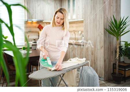 Home laundry routine brings freshness to everyday life with care and focus 135319006