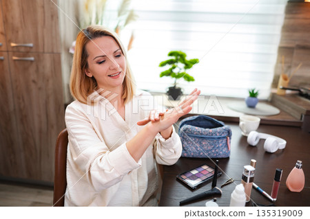 Creating beauty and confidence at a cozy workspace filled with art 135319009