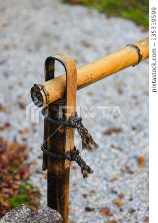 Close up detail of Japanese tradition style bamboo fence panel. Close up detail of Japanese tradition style bamboo fence panel. 135319599