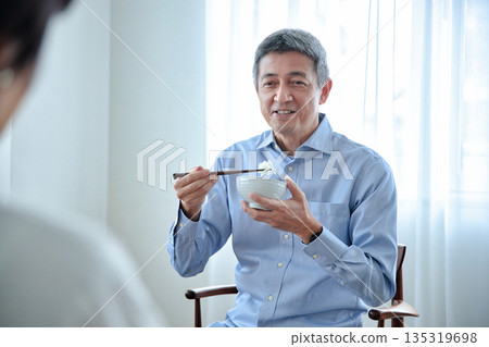 Senior couple having a meal Senior couple having a meal 135319698