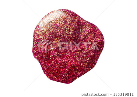 A sample of red nail polish with a shimmer and metallic effect. Isolated on a white background. 135319811